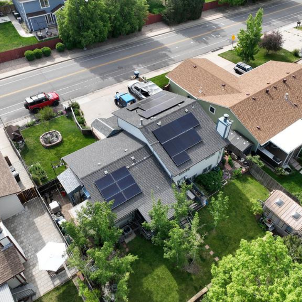 aerial view of neighborhood homes showing newly installed solar shingle roof