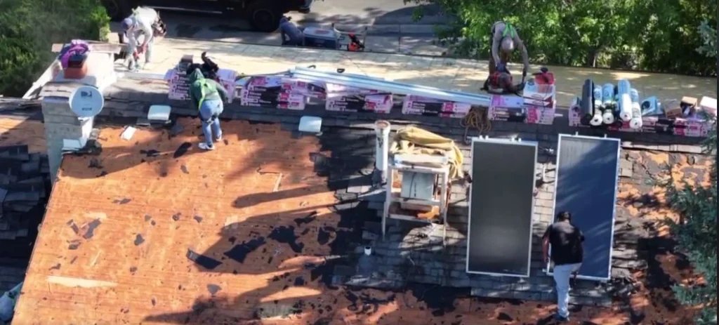 Residential roof replacement in progress—photo used in “How much does a new roof cost in 2025?”